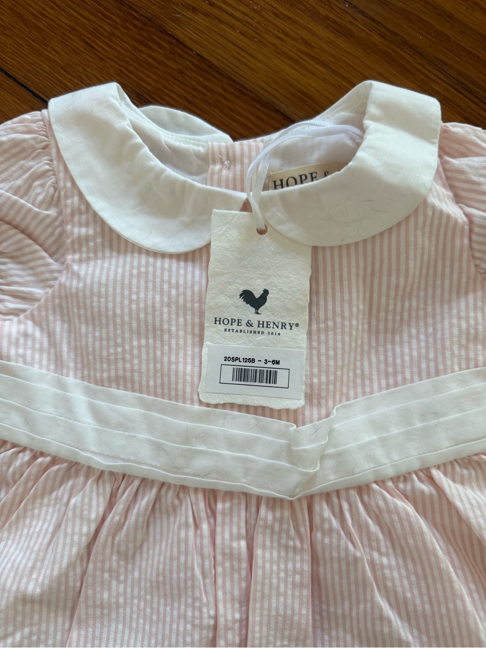 Hope & Henry Pink Seersucker Striped Baby Dress with White Peter Pan Collar